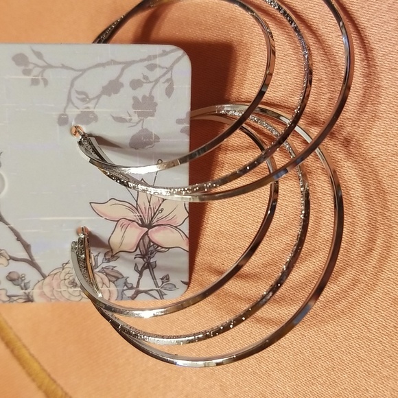 New large silver hoop earrings. - Picture 3 of 6